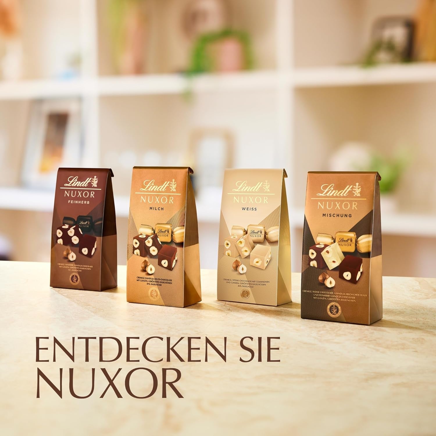 Chocolat Lindt | Mélange pour sac NUXOR | 103g | Cubes de chocolat crémeux au Gianduja en trois assortiments avec noisettes entières grillées | Cadeau chocolat