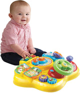 VTech Baby Adventure Play Table - Table de jeu colorée pour bébés avec 6 terrains de jeu et éléments interactifs & Baby My First Song Book Livre coloré de 6 pages et éléments mobiles pour jouer Bebe Toys Naty Shop