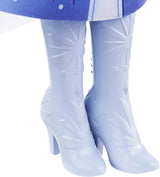 Mattel Disney Princess Elsa Poupée La Reine des Neiges en tenue de voyage, cheveux blonds coiffables, articulation articulée, jupe et bottes amovibles, cadeaux Disney, jouet pour 3 ans et plus, HLW48