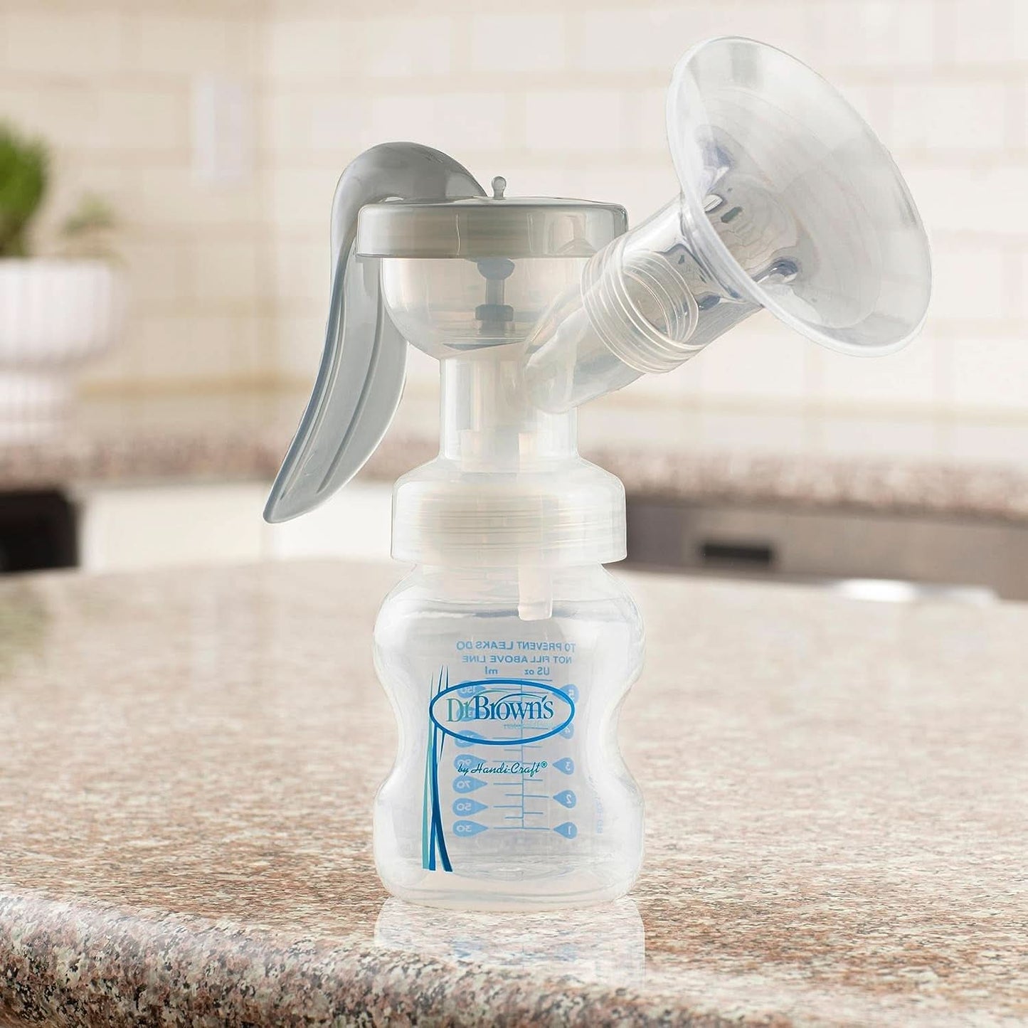 Tire-lait manuel avec protection Softshape 100% silicone (B, bride 25 mm) et options anti-coliques + biberon 150 ml à col large avec tétine à débit lent niveau 1 Accessoires Alimentation et Allaitement Bebe Naty Shop
