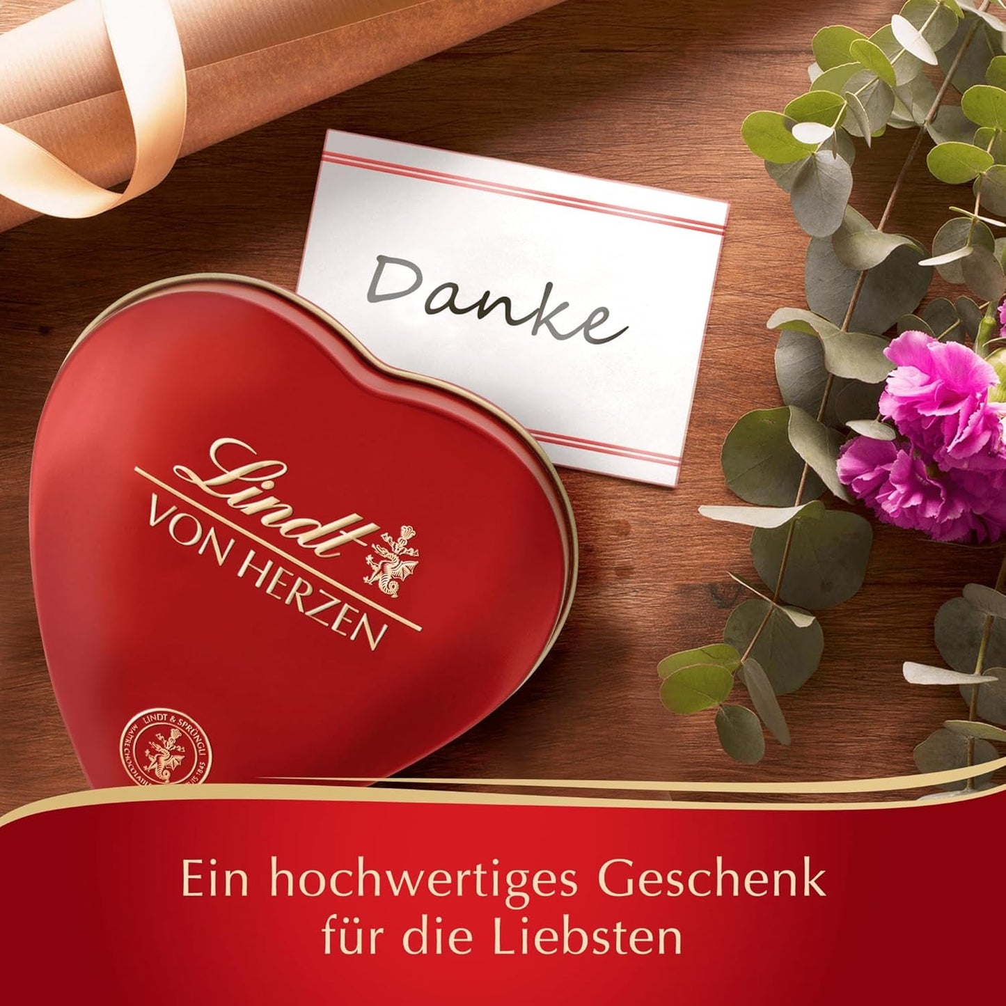 Chocolat Lindt du cœur | 30g | 6 pralines au Marc de Champagne, Coeur à l'Orange, Croustillant de Chocolat au Lait, Massepain Orange dans une jolie boîte en forme de coeur | Cadeau de chocolat | Cadeau chocolat