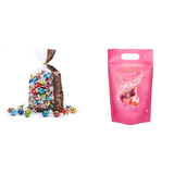 Mélange de chocolat LINDOR | 1371g | Env. 109 boules : Boules de chocolat au lait et LINDOR à la crème de fraise | Sac de 1 kg, env. 80 boules de chocolat chocolat blanc à la crème de fraise
