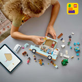 LEGO Friends Caravan, jeu de construction de rôle avec une caravane jouet, cadeau pour les filles à partir de 7 ans, jeu créatif avec 3 figurines et figurine d'animal furet 42663 Jeux de construction Besuche den LEGO-Store