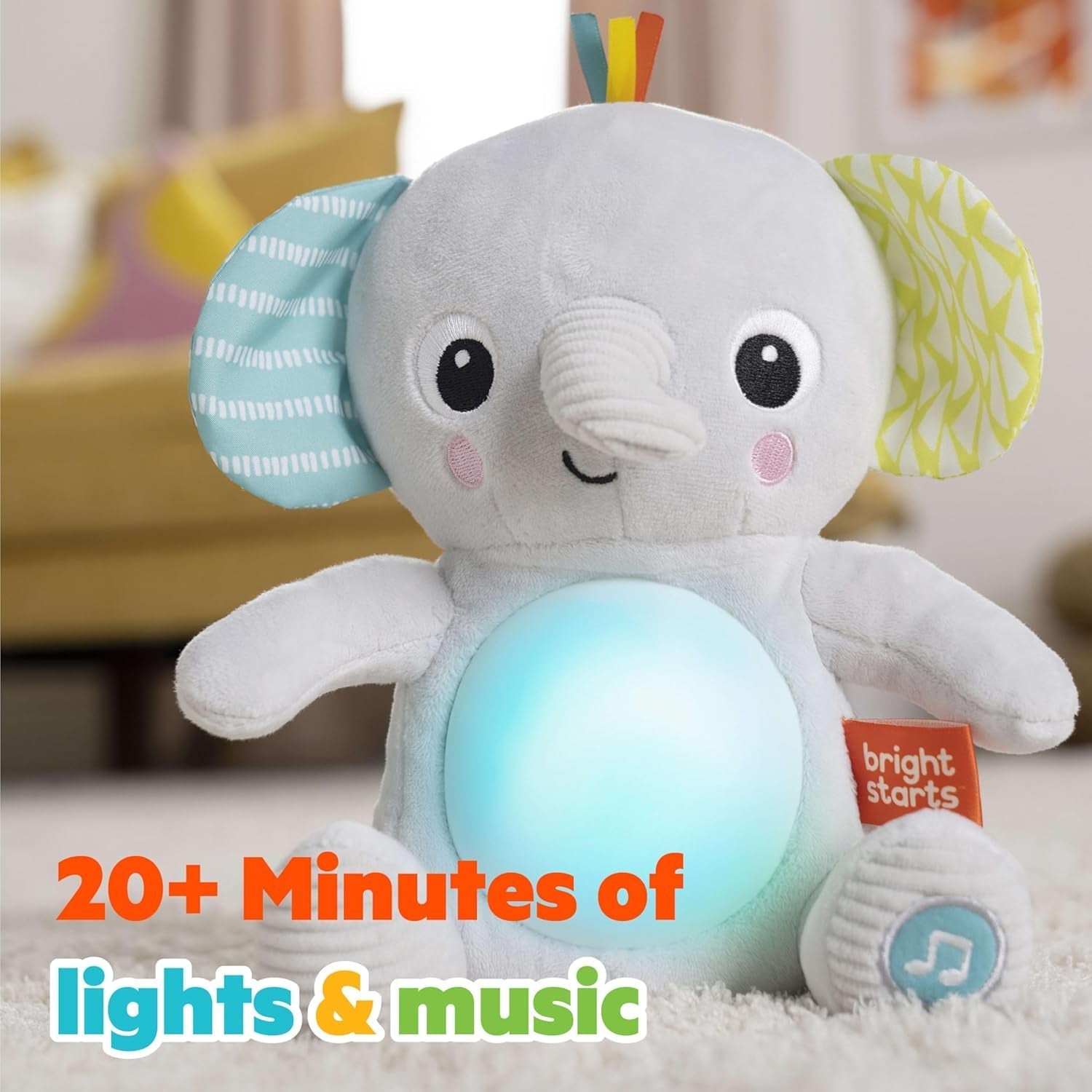 Bright Starts, jouet bébé éléphant Hug-a-bye avec lumières, chansons, différentes textures et plus encore, multicolore Jouets Bebe Naty Shop