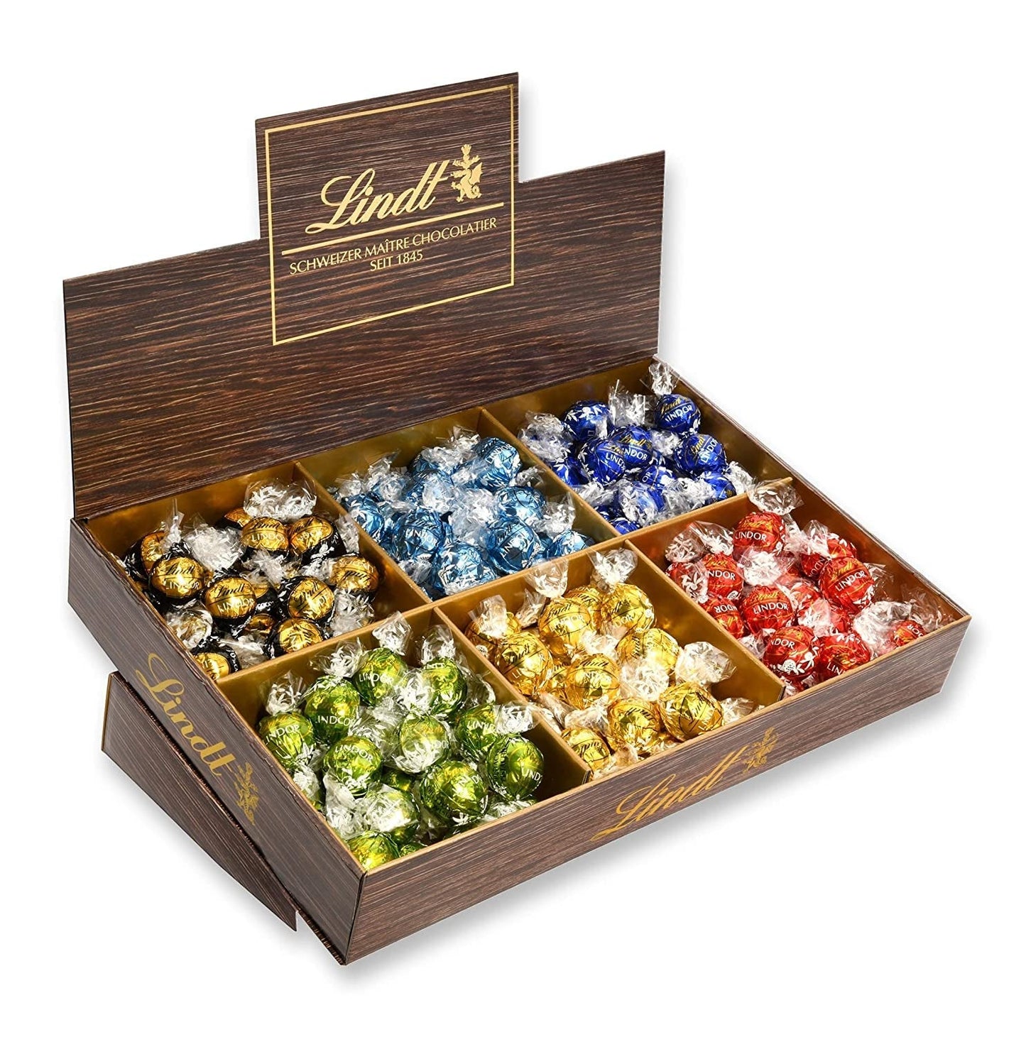 Présentation du dessus de chocolat Lindor | 1718 g and chocolate bars with marzipan | 25 barres x 50g en présentoir | 1250g | Pâte d'amande pure recouverte de chocolat noir | Barres de chocolat
