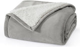 UGG 01465 Bliss Sherpa Couverture entièrement réversible pour canapé ou lit Lavable en machine Facile d'entretien Couverture de luxe surdimensionnée en peluche douce 178 x 127 cm Seal Naty Shop Couettes et couettes
