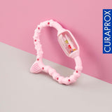 Anneau de dentition Curaprox pour bébés - Pour tout-petits 0-24 mois/Soulage la douleur dentaire et favorise les compétences motrices | Sans BPA, Rose, avec brosse à dents d'entraînement/Fabriqué en Suisse