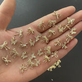 50pcs 3D Gold Bow Nail Charms Butterfly Nail Art Charms Legierung Bogen Nagel Charms Nägel Zubehör Schleife Nagelschmuck Metall Schleifen Schmetterling Nageldesign Nagelanhänger Nailart Strasssteine