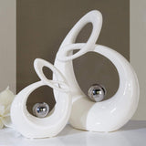GILDE Sculpture décorative en céramique Life - figurine blanc émaillé blanc/argent avec boule argentée - hauteur 22 cm Statuettes et sculptures Naty Shop